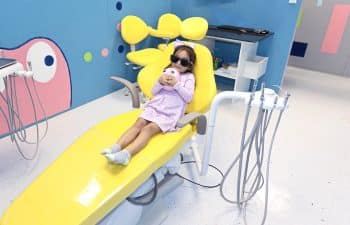 Girl on the dentist chair